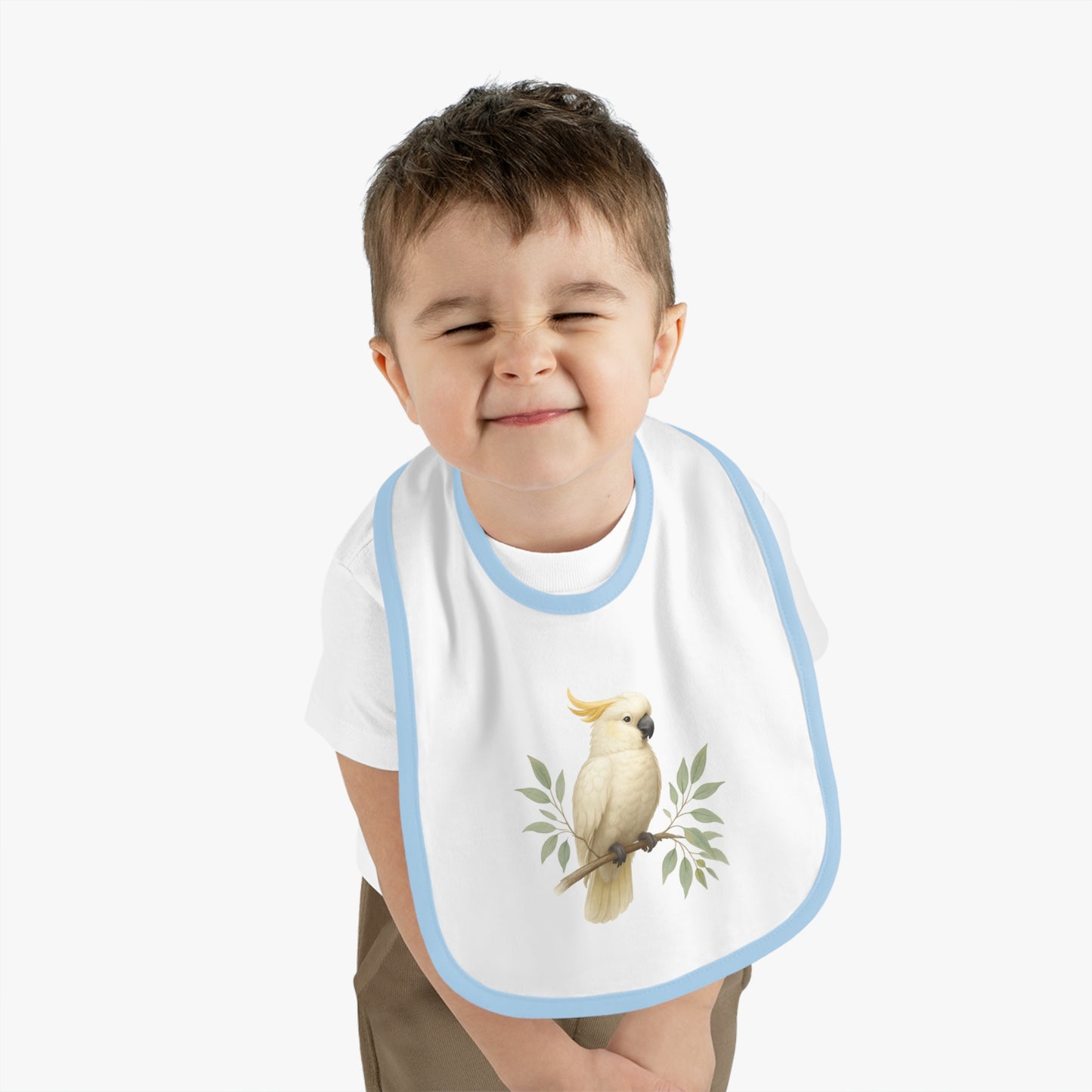 Cockatoo Baby Bib — Soft Contrast-Trim Jersey Bib with Watercolor Parrot Design